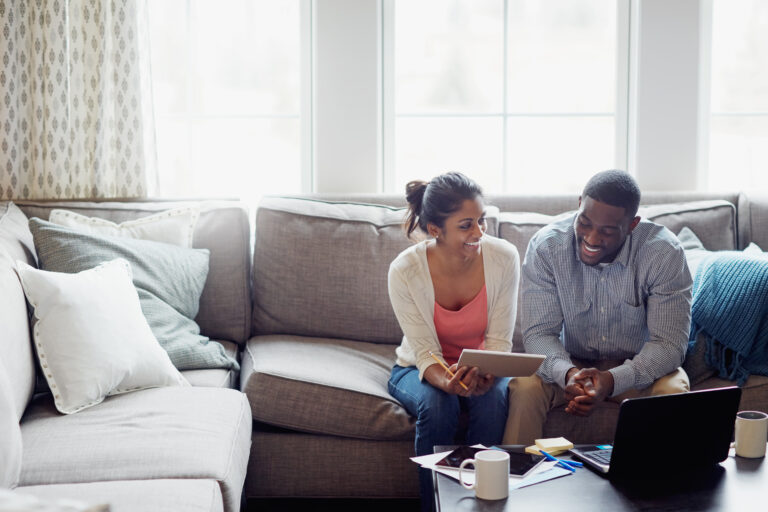 A couple discussing Mid-Year Window Makeover Ideas